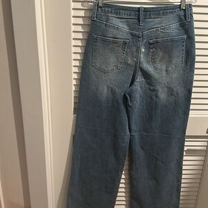 NWT Juicy Couture Lunita w/Stone Medium Wash and five pockets.